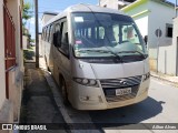 Ônibus Particulares terraco construtora na cidade de Carmo do Cajuru, Minas Gerais, Brasil, por Ailton Alves. ID da foto: :id.